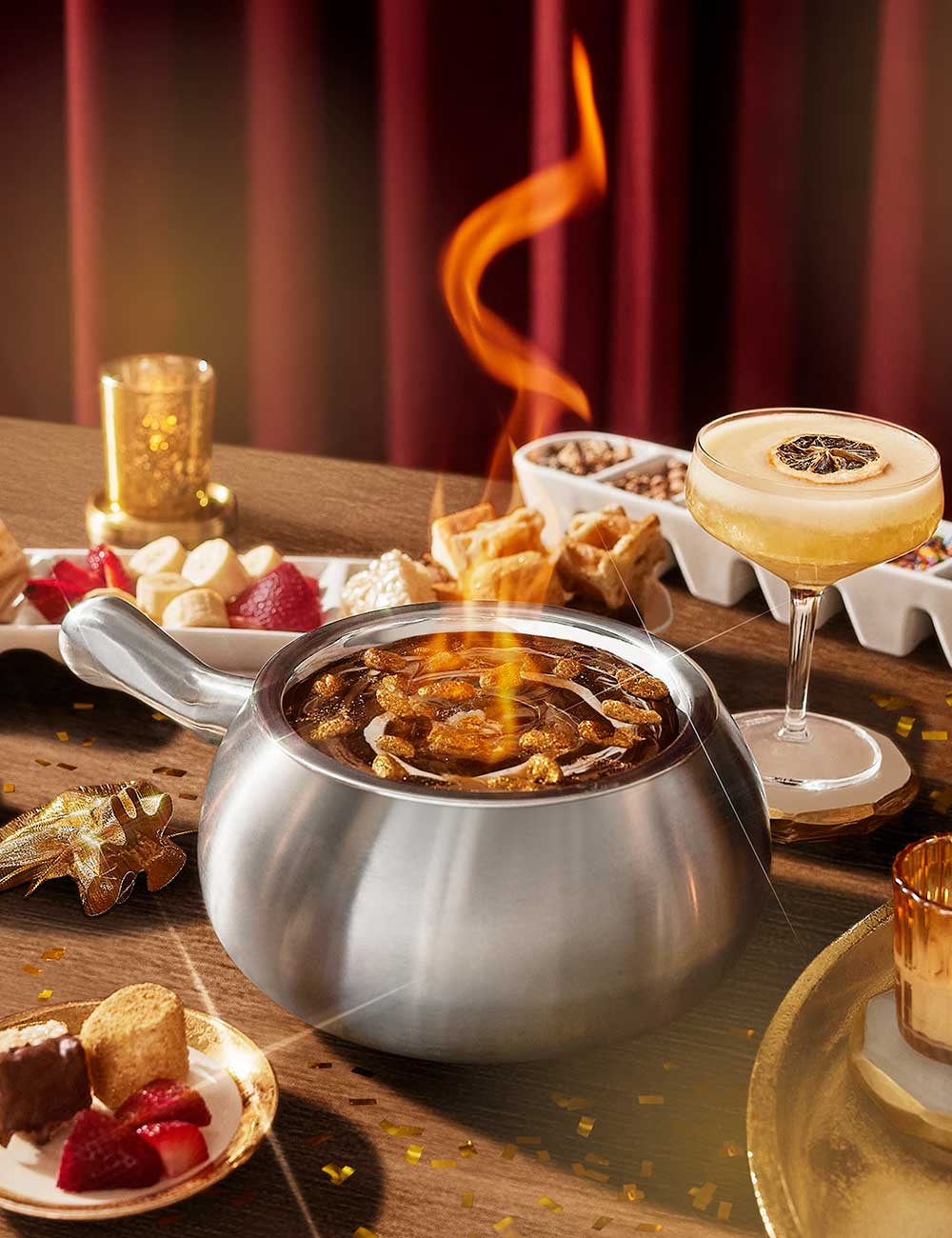a pot of food and drinks on a table