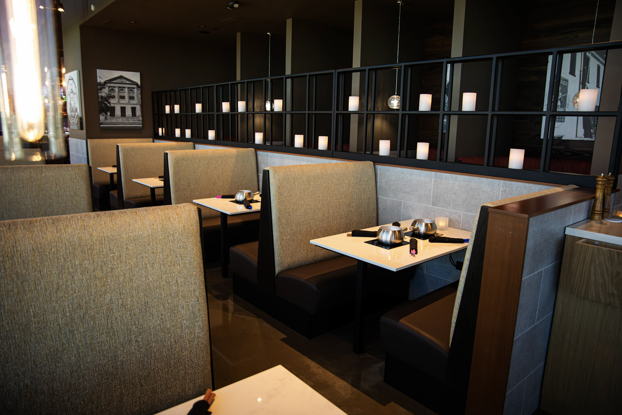 a restaurant with tables and chairs