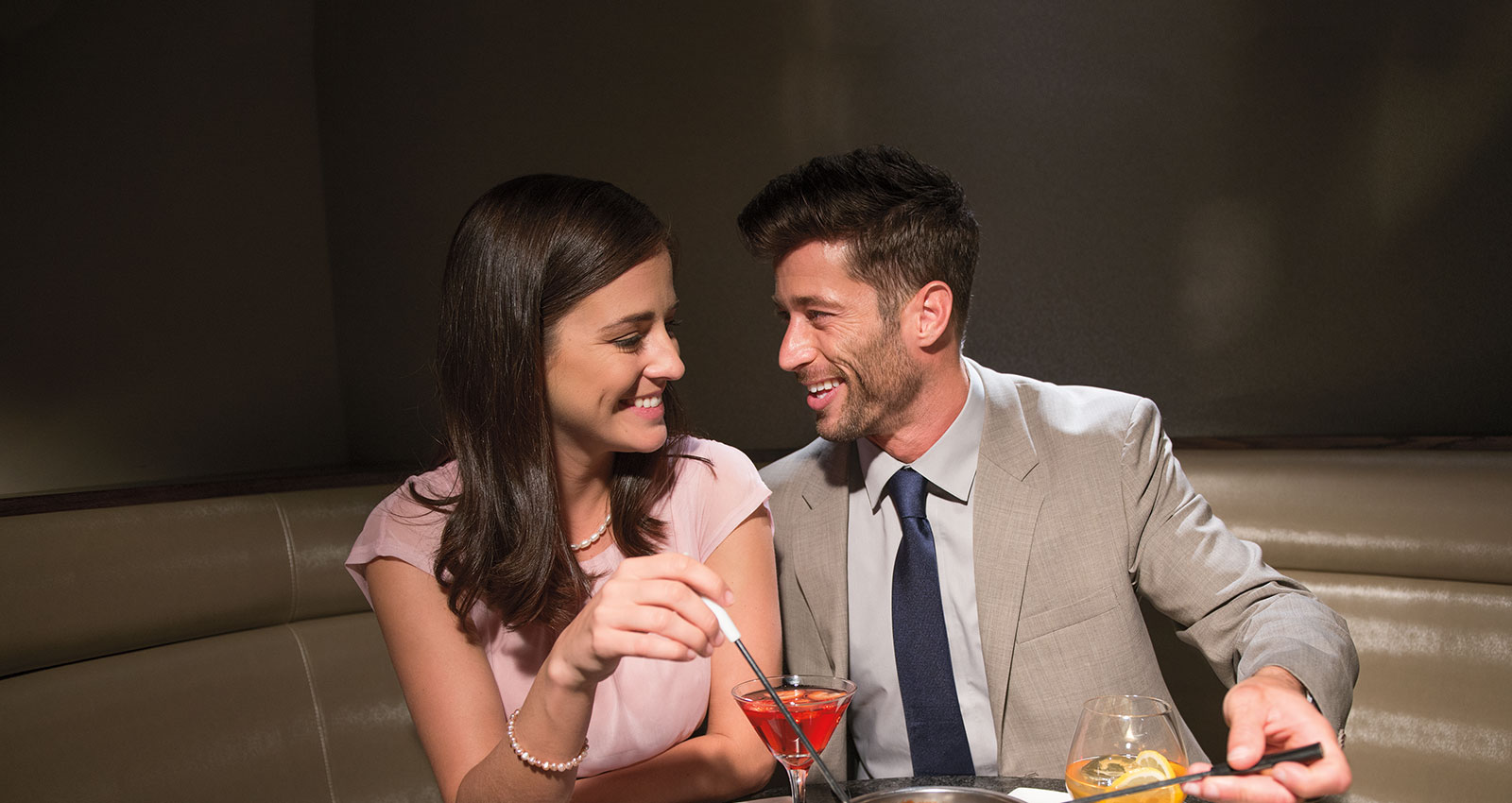 Couple enjoys nice conversation at The Melting Pot Restaurant