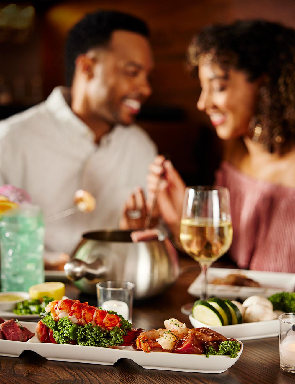 Couple with Ultimate Celebration Entrée at Melting Pot