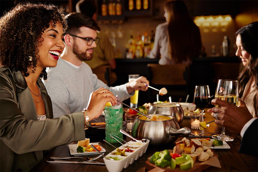 Couple with Ultimate Celebration Entrée at Melting Pot