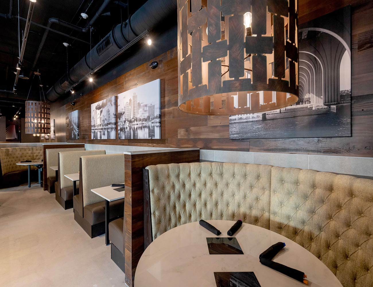 A booth for two at the Melting Pot in St. Petersburg, ready to host guests.
