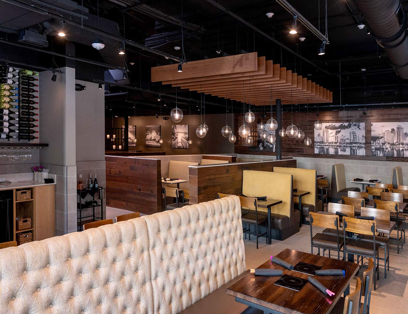 The spacious and modern dining room at the Melting Pot in St. Petersburg, ready to host guests.